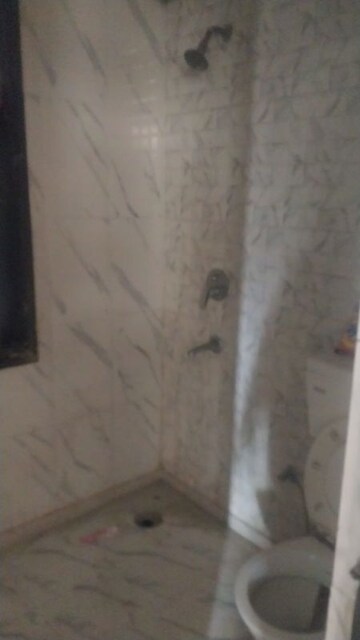 Bathroom in 2.5 BHK Apartment at Techman Moti Residency, Raj Nagar Extension – for Sale