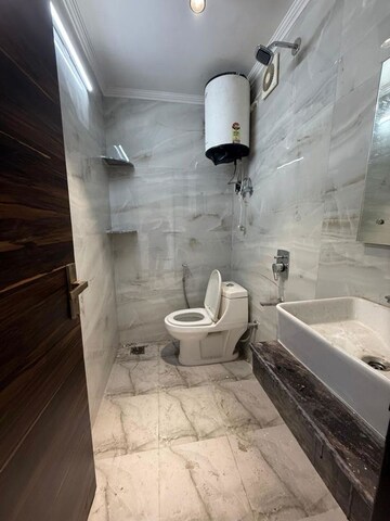 Bathroom in 2 BHK Builder Floor at Chattarpur – for Rent