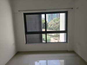 Room in 2 BHK Apartment at Kalpataru Immensa D, Kolshet Road – for Rent