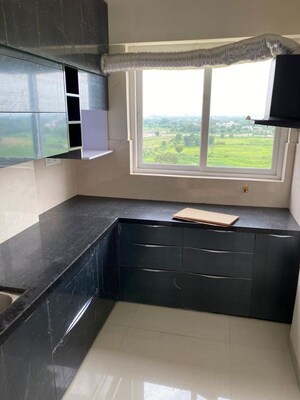 Kitchen in 1.5 BHK Apartment at Taruchaya Residency, Ajmer Road – for Sale