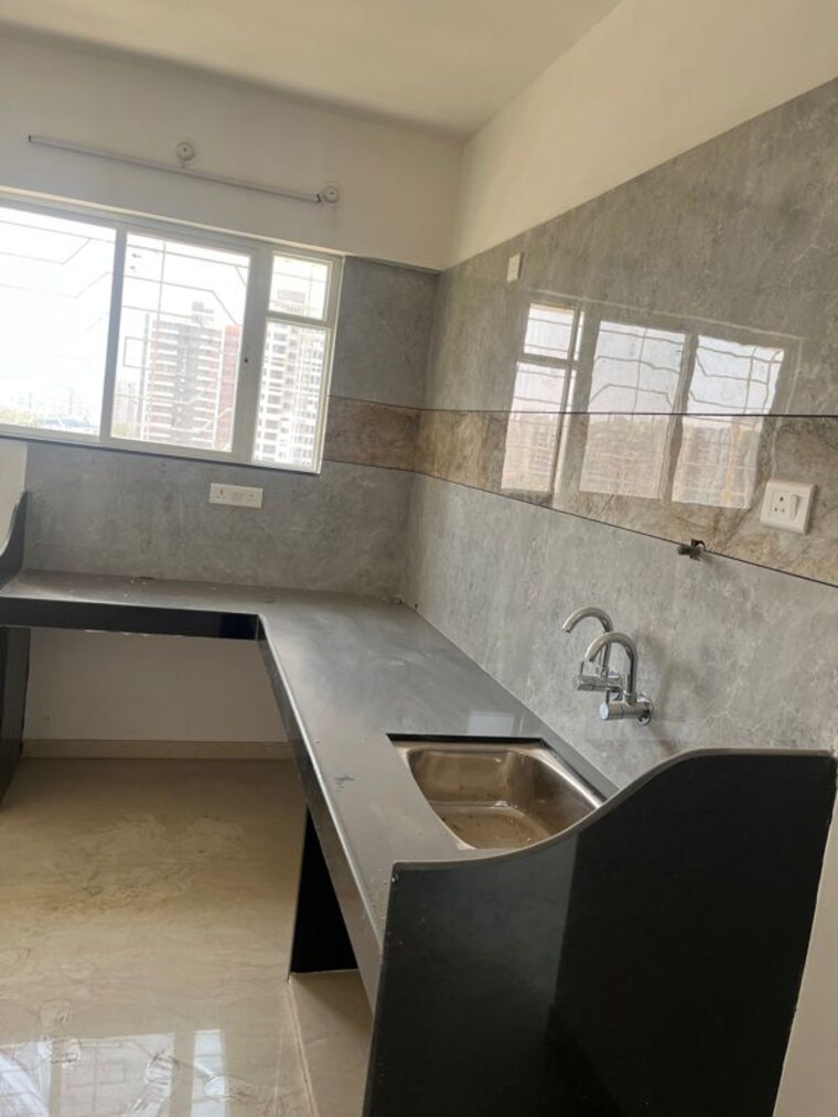 Kitchen, pantheon-acorn-park-phase-1 1 Bedroom 444 Sq.Ft. Apartment In Wakad Pune 10111452