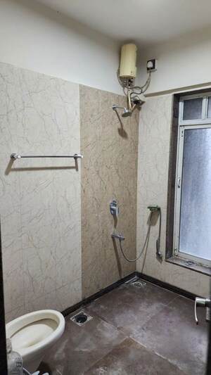 Bathroom in 2 BHK Apartment at Ram Mandir Industrial Estate, Goregaon East – for Rent