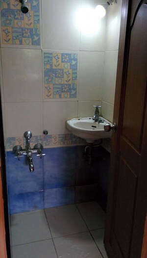 Bathroom in 1 BHK Apartment at Shivshakti Apartments, Andheri West – for Rent