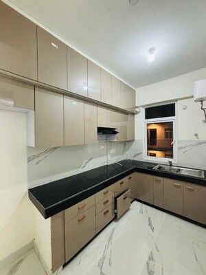 Kitchen in 3.5 BHK Apartment at Smart World Gems, Sector 89 – for Rent