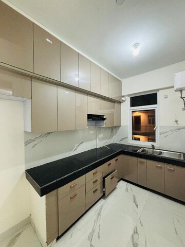Kitchen in 3.5 BHK Apartment at Smart World Gems, Sector 89 – for Rent