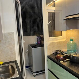 Kitchen in 2 BHK Apartment at Signature The Millennia 2, Garoli Kalan – for Rent