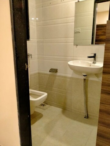 Bathroom in 1 BHK Apartment at Riverdale Tower, Andheri East – for Rent