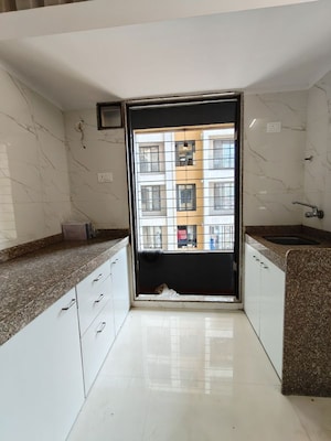 Kitchen in 2 BHK Apartment at Tiara Hills, Mira Road – for Rent