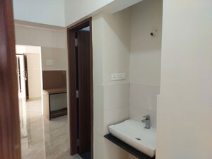 Bathroom in 3 BHK Apartment at Kohinoor Courtyard One, Wakad – for Rent