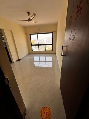 Living Room in 1 BHK Apartment at Gauri Excellency, Kandivali West – for Rent