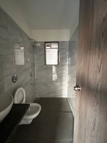 Bathroom in 2 BHK Apartment at Anant Metropolis Insignia Towers, Kasarvadavali – for Rent