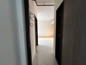Building Lobby in 2 BHK Apartment at Anant Metropolis Insignia Towers, Kasarvadavali – for Rent