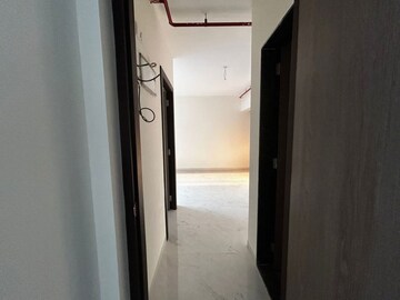 Building Lobby in 2 BHK Apartment at Anant Metropolis Insignia Towers, Kasarvadavali – for Rent
