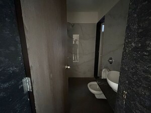 Bathroom in 2 BHK Apartment at Anant Metropolis Insignia Towers, Kasarvadavali – for Rent