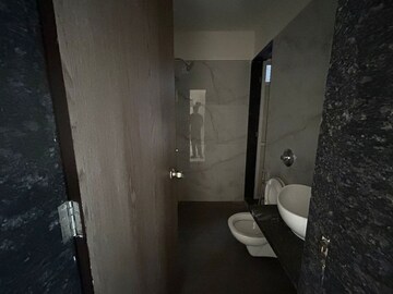 Bathroom in 2 BHK Apartment at Anant Metropolis Insignia Towers, Kasarvadavali – for Rent