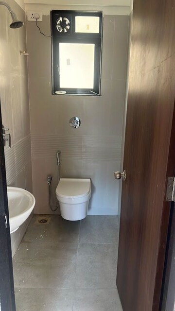 Bathroom in 1.5 BHK Apartment at Puneet Shivalaya, Tagore Nagar – for Rent
