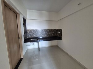 Kitchen in 2 BHK Apartment at Kohinoor Courtyard One, Wakad – for Rent