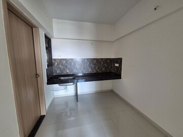 Kitchen in 2 BHK Apartment at Kohinoor Courtyard One, Wakad – for Rent