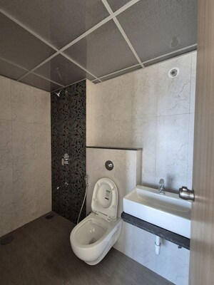 Bathroom in 2 BHK Apartment at Kohinoor Courtyard One, Wakad – for Rent