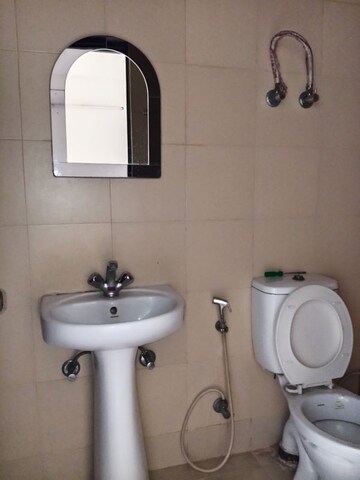 Bathroom in 3 BHK Apartment at Mahagun Mywoods, Sector 16c Greater Noida – for Rent