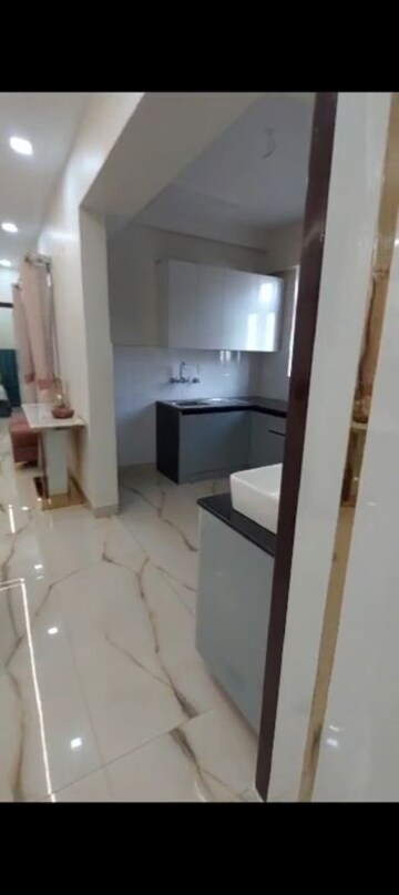 Bathroom in 2 BHK Apartment at Raj Nagar Extension – for Sale