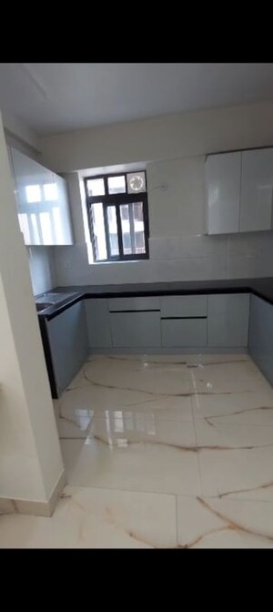 Kitchen in 2 BHK Apartment at Raj Nagar Extension – for Sale