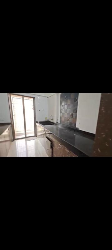 Kitchen in 2 BHK Apartment at Madhav Palacia, Ghodbunder Road – for Rent