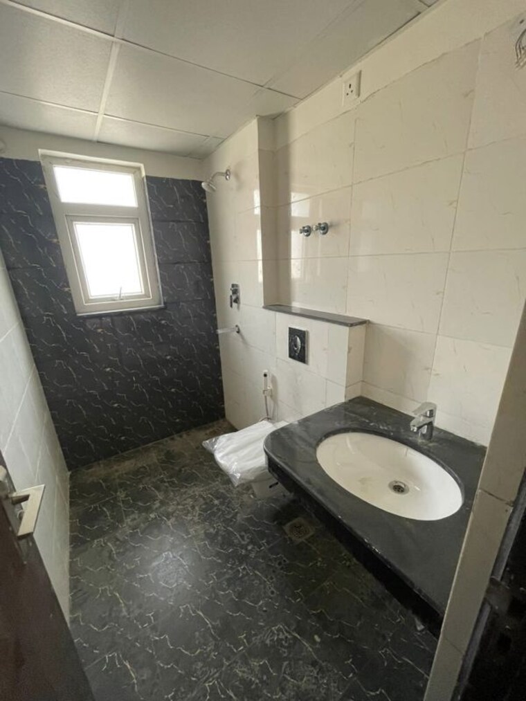 Bathroom, bptp-discovery-park 2 Bedroom 1259 Sq.Ft. Apartment In Sector 80 Faridabad 10112574
