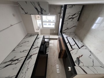 Kitchen in 2.5 BHK Apartment at Smart World Gems, Sector 89 – for Rent