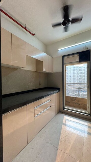 Kitchen in 2 BHK Apartment at JP North Elara, Mira Road – for Sale