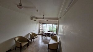 Living Room in 1 BHK Apartment at Gold Crown, Andheri West – for Sale
