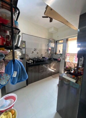 Kitchen in 1 BHK Apartment at Cosmos Park, Ghodbunder Road – for Sale