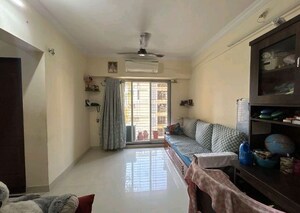 Living Room in 1 BHK Apartment at Cosmos Park, Ghodbunder Road – for Sale