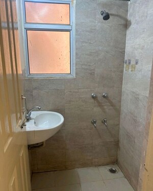 Bathroom in 1 BHK Apartment at Wave Dream Homes, Wave City – for Rent