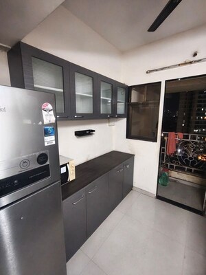 Kitchen in 1 BHK Apartment at Cosmos Jewels, Ghodbunder Road – for Sale