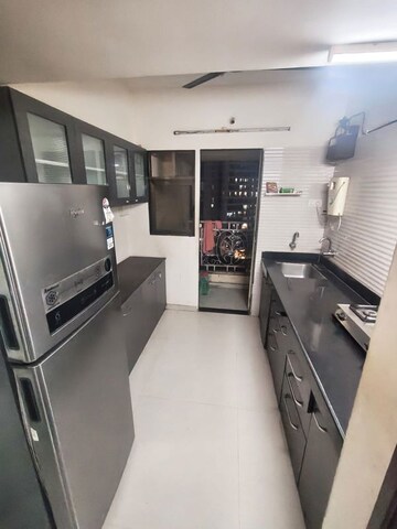 Kitchen in 1 BHK Apartment at Cosmos Jewels, Ghodbunder Road – for Sale