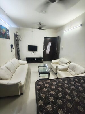 Living Room in 1 BHK Apartment at Cosmos Jewels, Ghodbunder Road – for Sale