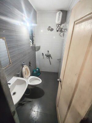 Bathroom in 1 BHK Apartment at Cosmos Jewels, Ghodbunder Road – for Sale