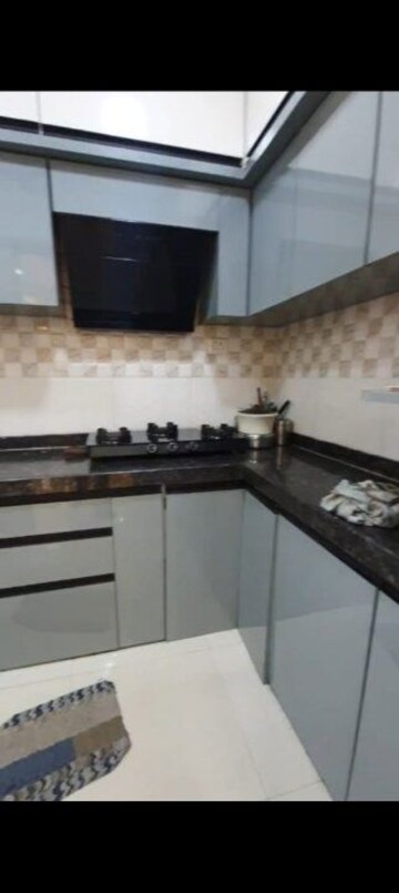 Kitchen in 2 BHK Apartment at Gurukrupa Guru Anant Apartment, Ulwe Sector 2 – for Sale