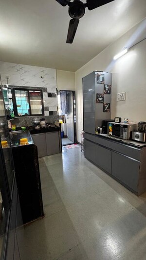 Kitchen in 3 BHK Apartment at Riswadkar AmrutKalash, Karve Nagar – for Sale