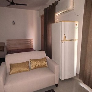 Living Room in 1 RK Apartment at Supertech Czar Suites, Omicron I Greater Noida – for Sale