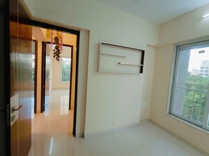 Room in 2 BHK Apartment at Acme Avenue, Kandivali West – for Sale