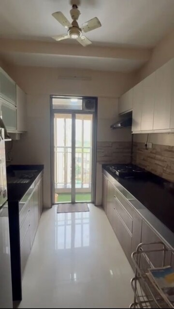 Kitchen in 2 BHK Apartment at Lodha Aqua, Mira Road – for Rent