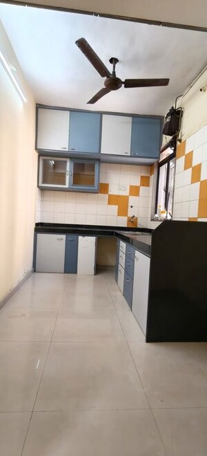 Kitchen in 1 BHK Apartment at Metropolis Bayside, Kasarvadavali – for Sale