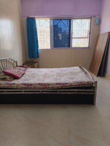 Bedroom in 2 BHK Apartment at Yashkrupa CHS Ltd, Borivali West – for Rent