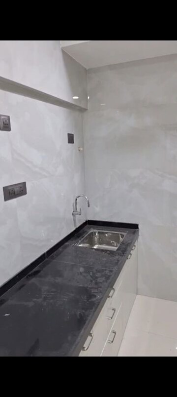 Bathroom in 1 BHK Apartment at Poonam Vaishno Heights, Malad East – for Rent