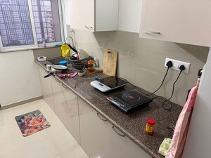 Kitchen in 1.5 BHK Apartment at Puranik City Reserva, Ghodbunder Road – for Rent