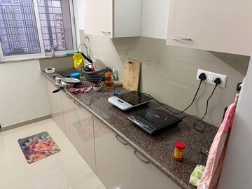 Kitchen in 1.5 BHK Apartment at Puranik City Reserva, Ghodbunder Road – for Rent
