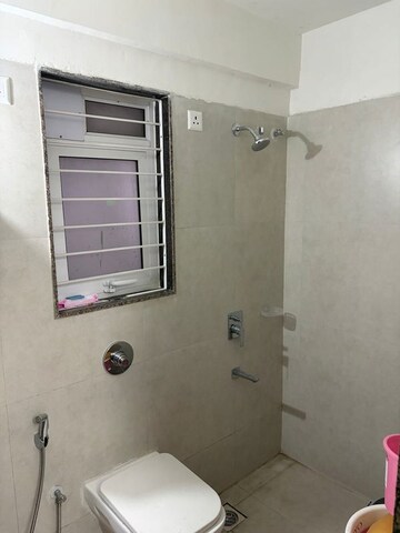 Bathroom in 1.5 BHK Apartment at Puranik City Reserva, Ghodbunder Road – for Rent