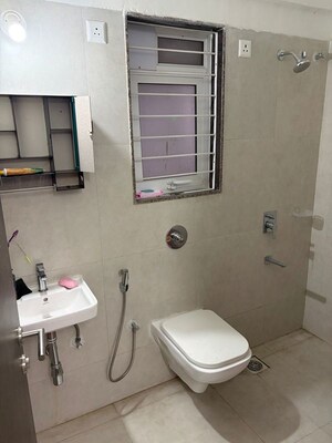 Bathroom in 1.5 BHK Apartment at Puranik City Reserva, Ghodbunder Road – for Rent